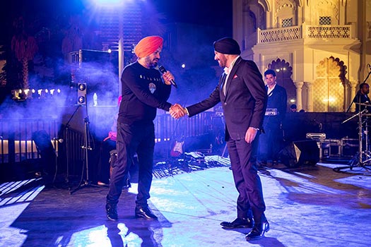 Mr. Harmeek Singh and Gurpreet Ghuggi on stage of Apna Punjab